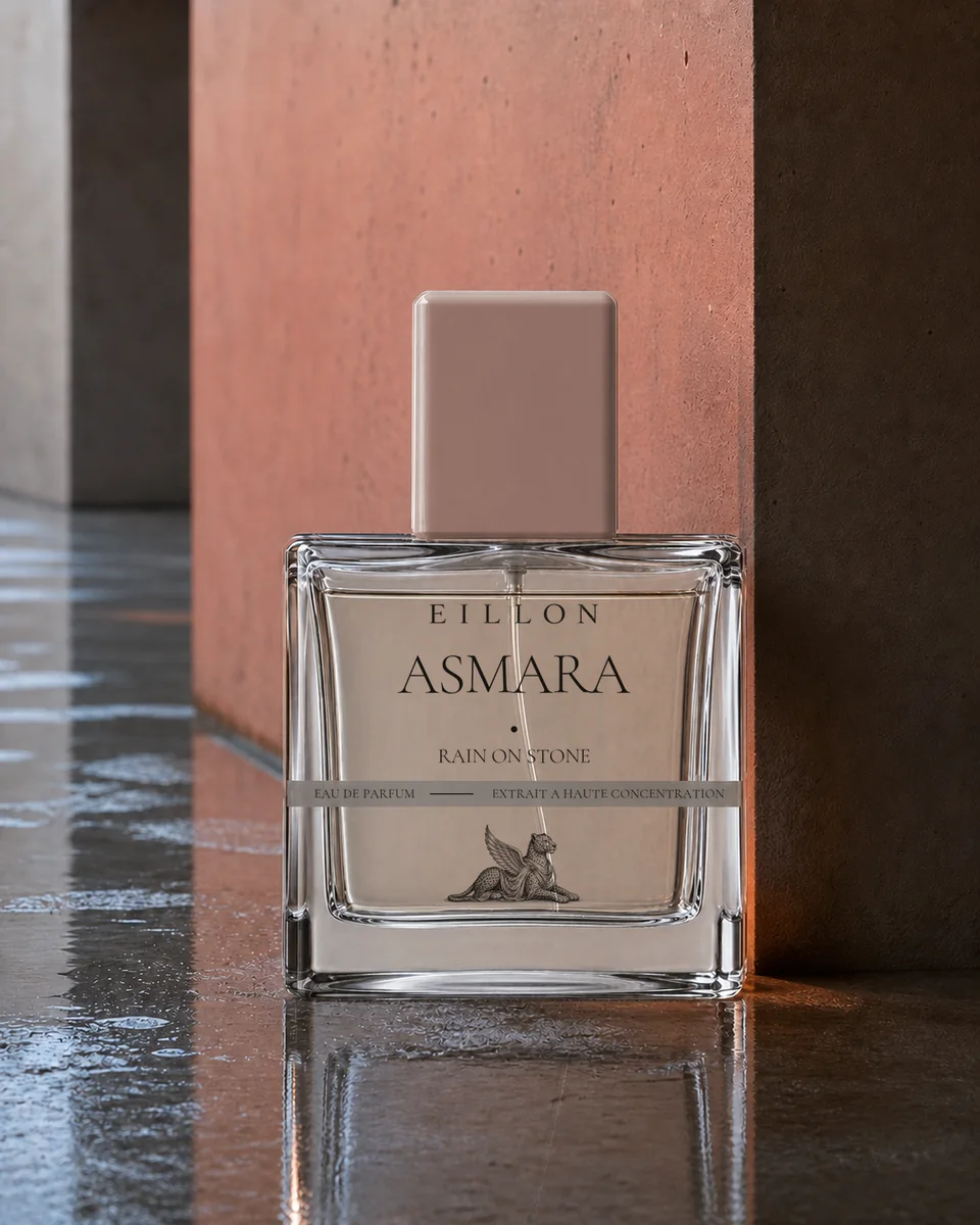 Asmara packaging concept in liquid-filled clear square glass with a rain-coral taupe cap and complete grey-band typography; not documentary product photography.